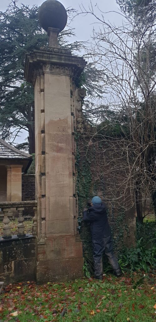 Grounds maintenance in a Victorian formal garden